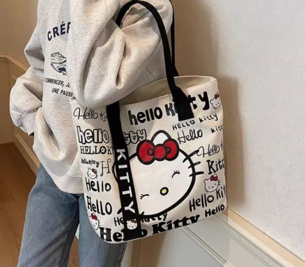 กระเป๋าถือผู้หญิงกระเป๋าแฟชั่นผ้าใบลายการ์ตูนน่ารักใส่ได้กับคนเดินทางกระเป๋าสะพายเดียวความจุมาก